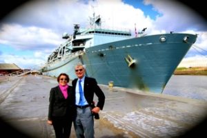 Geoff & Jan on the quey with HMS Bulwark